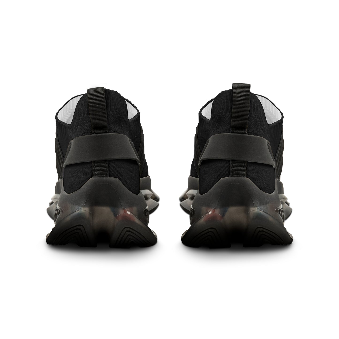 Black high-top sneakers with velcro straps on a white background