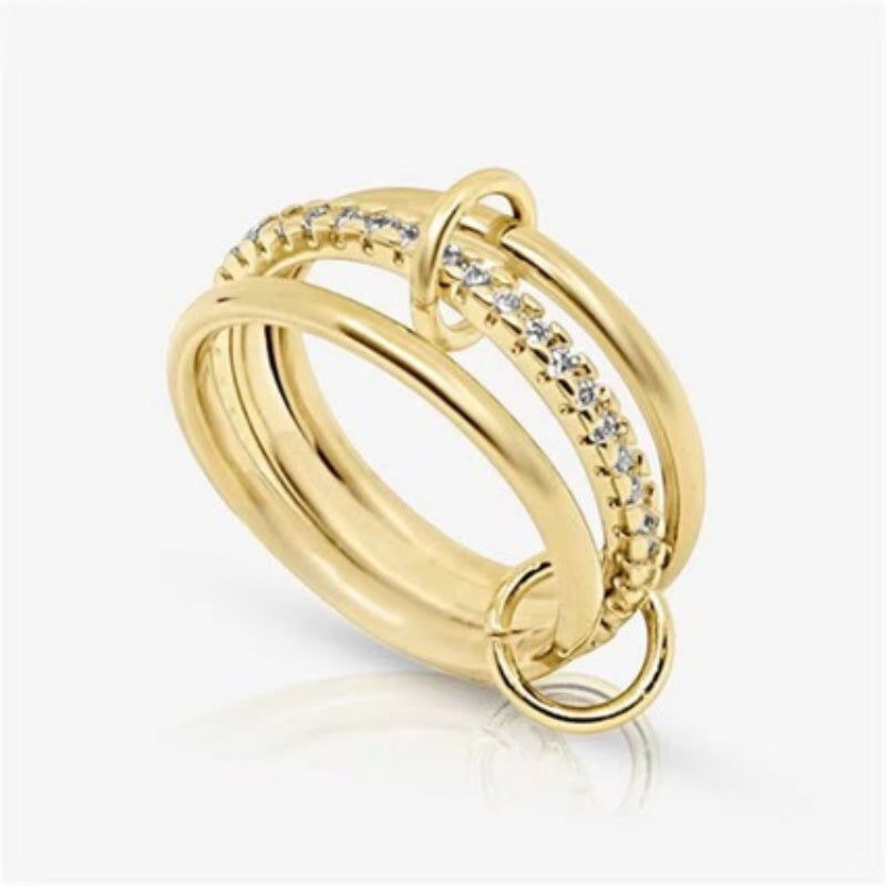 Three Interlocking Zircon Rings Stacked Together For A Layered Look
