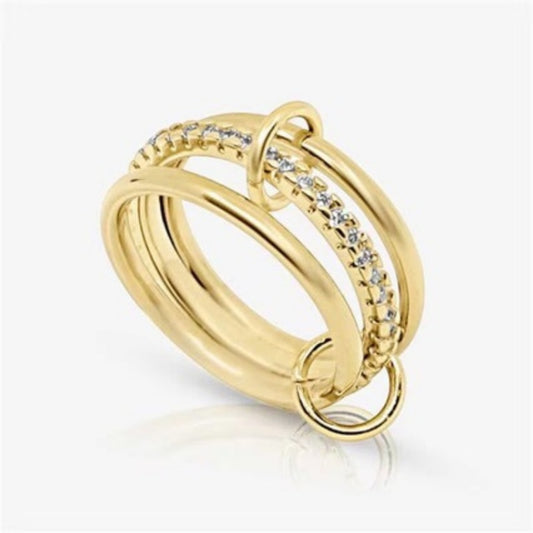 Three Interlocking Zircon Rings Stacked Together For A Layered Look