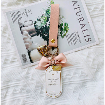 Leather Bookmark Bow Keychain | Red & Pink