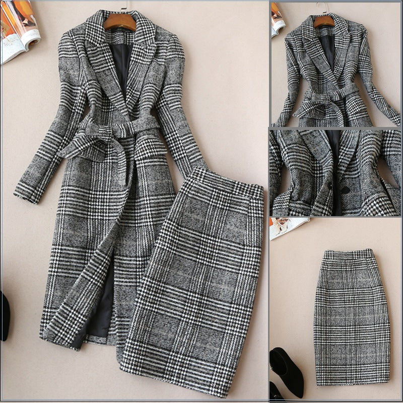 Plaid coat and skirt set on a neutral background