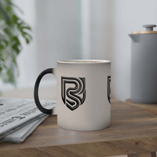 White mug with black handle and logo on a wooden surface with a blurred background