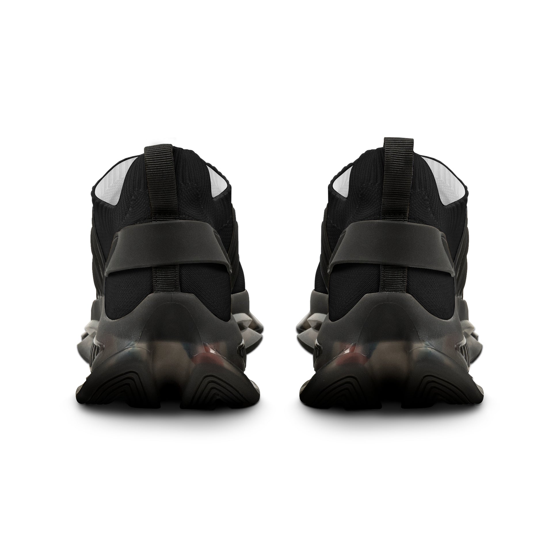 Black high-top sneakers with velcro straps on a white background
